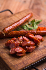 Delicious Sliced Smoked Sausage on Rustic Wooden Cutting Board