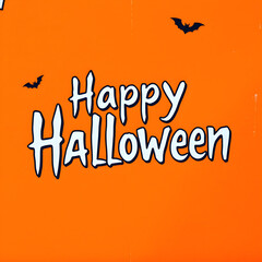 Obraz premium The inscription Halloween on an orange background. Generative AI