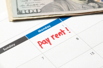 Fototapeta premium Pay rent reminder written on calendar