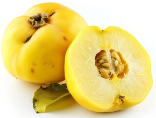 A whole quince with a slice showing the inside on a white background