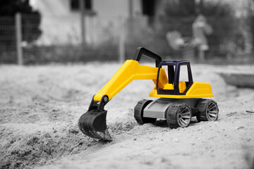 excavator on the beach