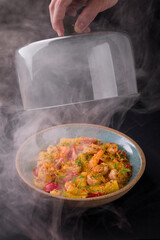 Gourmet Shrimp Dish in Smoky Presentation for Elegant Dining