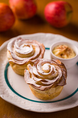 Delicious Apple Rose Pastries with Powdered Sugar on Plate