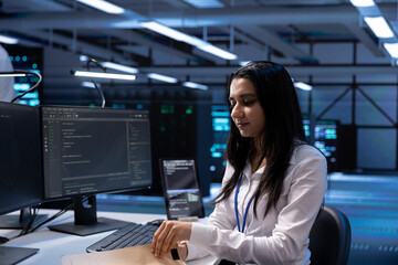 Data center specialist developing emergency procedures to ensure business continuity in case of...