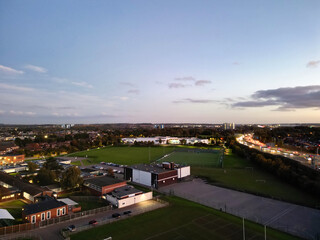 Aerial View of Illuminated Luton City of England UK at Just After Sunset and Full Moon Night. Aerial Footage Was Captured with Drone's Camera on October 17th, 2024