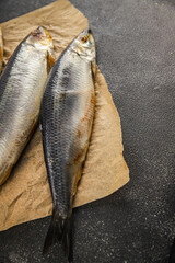 Herring fresh fish seafood pescetarianism tasty food dish fresh delicious gourmet food background on the table rustic food top view copy space top view keto and paleo diet vegetarian