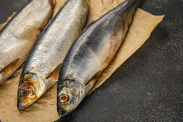 Herring fresh fish seafood pescetarianism tasty food dish fresh delicious gourmet food background on the table rustic food top view copy space top view keto and paleo diet vegetarian