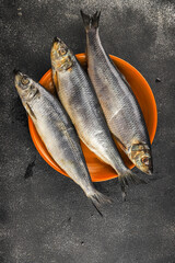 Herring fresh fish seafood pescetarianism tasty food dish fresh delicious gourmet food background on the table rustic food top view copy space top view keto and paleo diet vegetarian