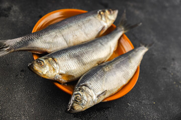 Herring fresh fish seafood pescetarianism tasty food dish fresh delicious gourmet food background on the table rustic food top view copy space top view keto and paleo diet vegetarian