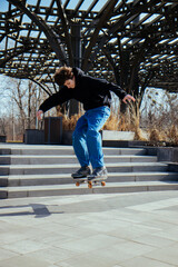 A skater soars through the air after jumping off a set of stairs, showcasing impressive skills and daring. The dynamic shot captures the thrill of skateboarding and the excitement of the moment.