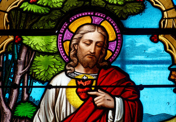 Obraz premium 2024-10-15, Collomiers, FRANCE. Stained glass (19th century) of Sacred Heart of Jesus Christ.