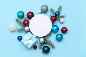 Blank card and Christmas decor on blue background