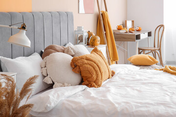 Interior of bedroom with autumn decor