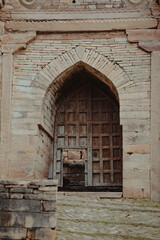 old wooden door in a wall
