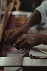 close up of hands of the carpenter