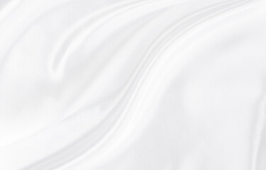 White gray satin texture that is white silver fabric silk background with beautiful soft blur pattern natural.