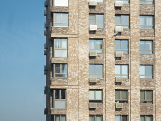 Fototapeta premium Sunny Day with Blue Sky and High-Rise Buildings in a Newly Developed Residential District