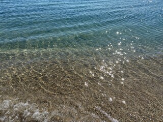 waves on the beach. Clear sea water texture