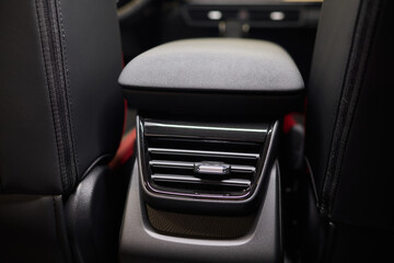 A close up of a car s rear air conditioning system