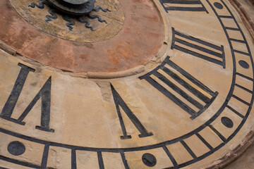 Close up of the ancient clock of Accursi palace tower , also known as the Palazzo Comunale d'Accursio, Piazza Maggiore square, Bologna in Italy. 05.01.2024