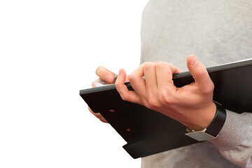 Man taking some notes on a clipboard