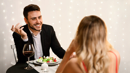 In Good Company. Couple In Love Enjoying Romantic Dinner In Restaurant, Chatting And Spending Time Together