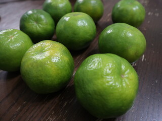 fresh food background of  green tangerines design for healthy diet