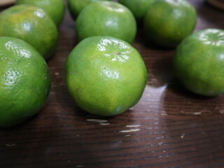 fresh food background of  green tangerines design for healthy diet