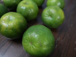 fresh food background of  green tangerines design for healthy diet