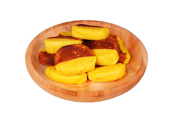 Stacked kue pukis on a wooden plate isolated transparent