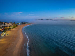 Foggy sunrise at the seaside