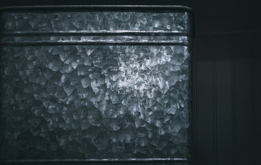 closeup hammered metal vintage grunge galvanized container surface room for copy background
