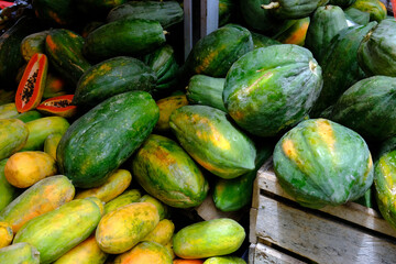 Indonesia Manado - Minahasa Regency - Traditional Market Tomohon - Papaya - Stacked papayas