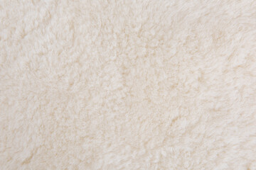 white plush fabric texture background , background pattern of soft warm material