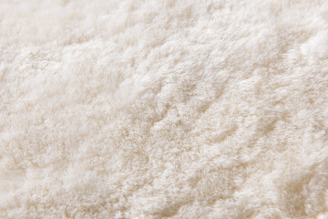 white plush fabric texture background , background pattern of soft warm material