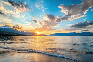 Obraz premium A stunning sunset over a calm sea, with vibrant colors reflecting on the water and clouds scattered across the sky.