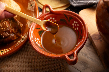 Mole Poblano. Chicken with Mole. Typical dish, emblematic of Mexican food made with a mixture of...