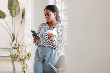 Office, coffee and black woman with cellphone for online, text message and reading on social media....