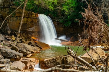 Obraz premium Serene waterfall cascading over rocks into a clear pool. Douglas Falls, West Virginia