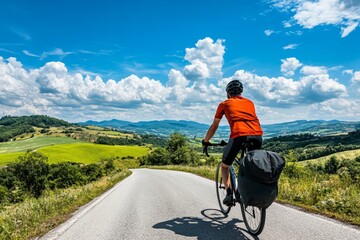 Fototapeta premium Scenic countryside cyclist promotes zero-emission travel, healthy living, lifestyle, sustainable, green adventure.