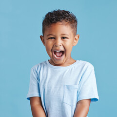 Scream, surprise and portrait of child in studio for excited, announcement or facial expression....