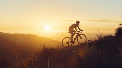 Fototapeta premium breathtaking silhouette of a cyclist ascending a hill