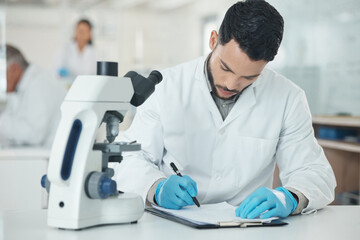 Fototapeta premium Scientist, man and writing with checklist in lab for study, stats and results with microscope for research. Person, clipboard and documents for pharmaceutical innovation with medicine development