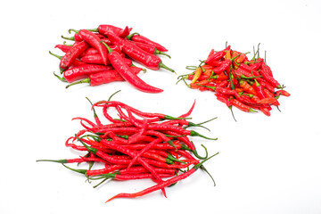Fototapeta premium Isolated Peppers Collection. Various Red Hot Chili, Cayenne And Other Peppers Selection Isolated On white Background. Types Of Different Peppers Background Texture. Set Of Variety Red Peppers.