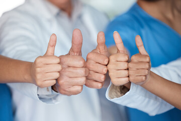 Hospital, team and hands of people with thumbs up for medical service, feedback and agreement....