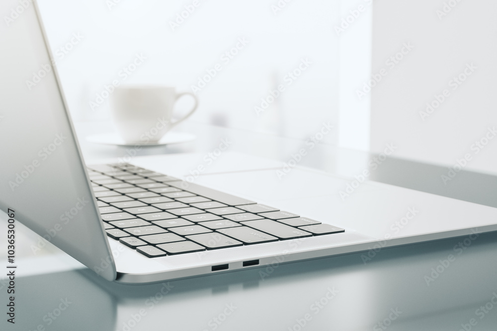 Poster Close up of modern laptop side view with white coffee cup on light table with abstract reflection. 3D rendering