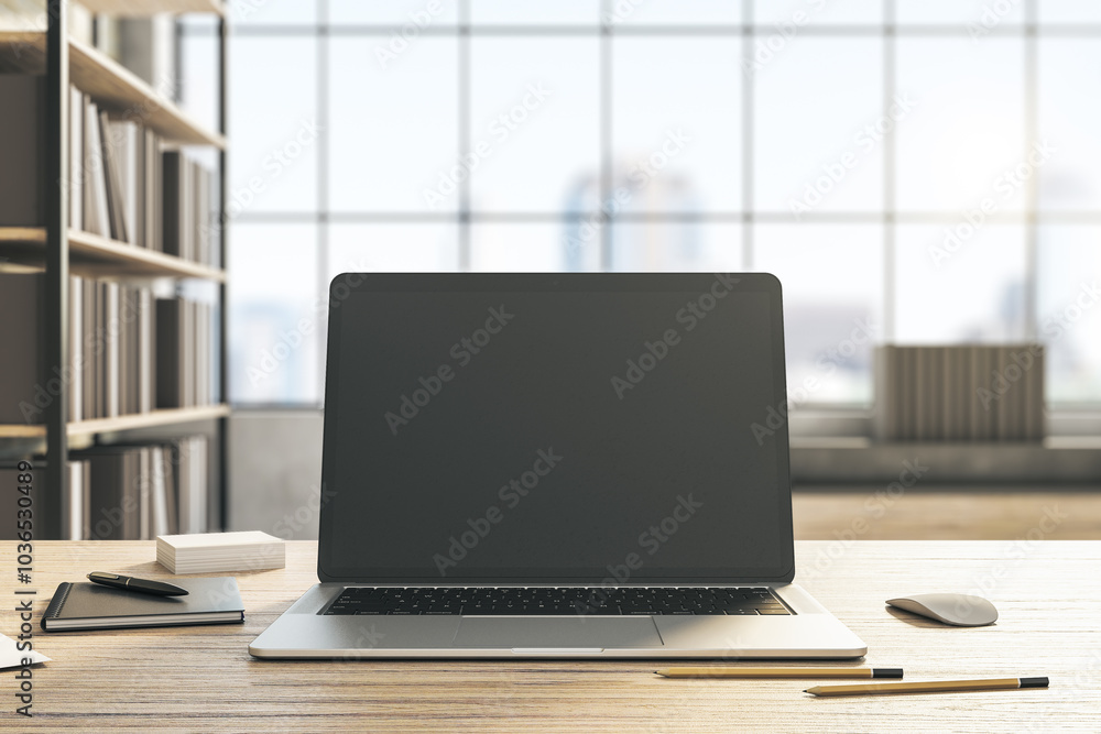 Poster front view on modern laptop blank black monitor with copyspace for your text or logo on light wooden