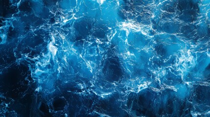 Obraz premium Serene Blue Water Surface with Gentle Waves and Reflections