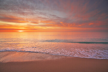 Sandy seashore at sunset