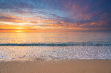 Sandy seashore at sunset